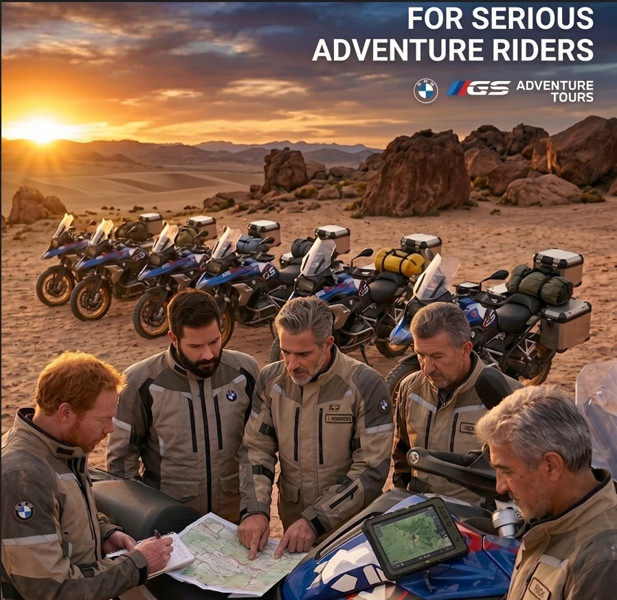KSA GS Adventure instructors briefing around the route plan in the desert